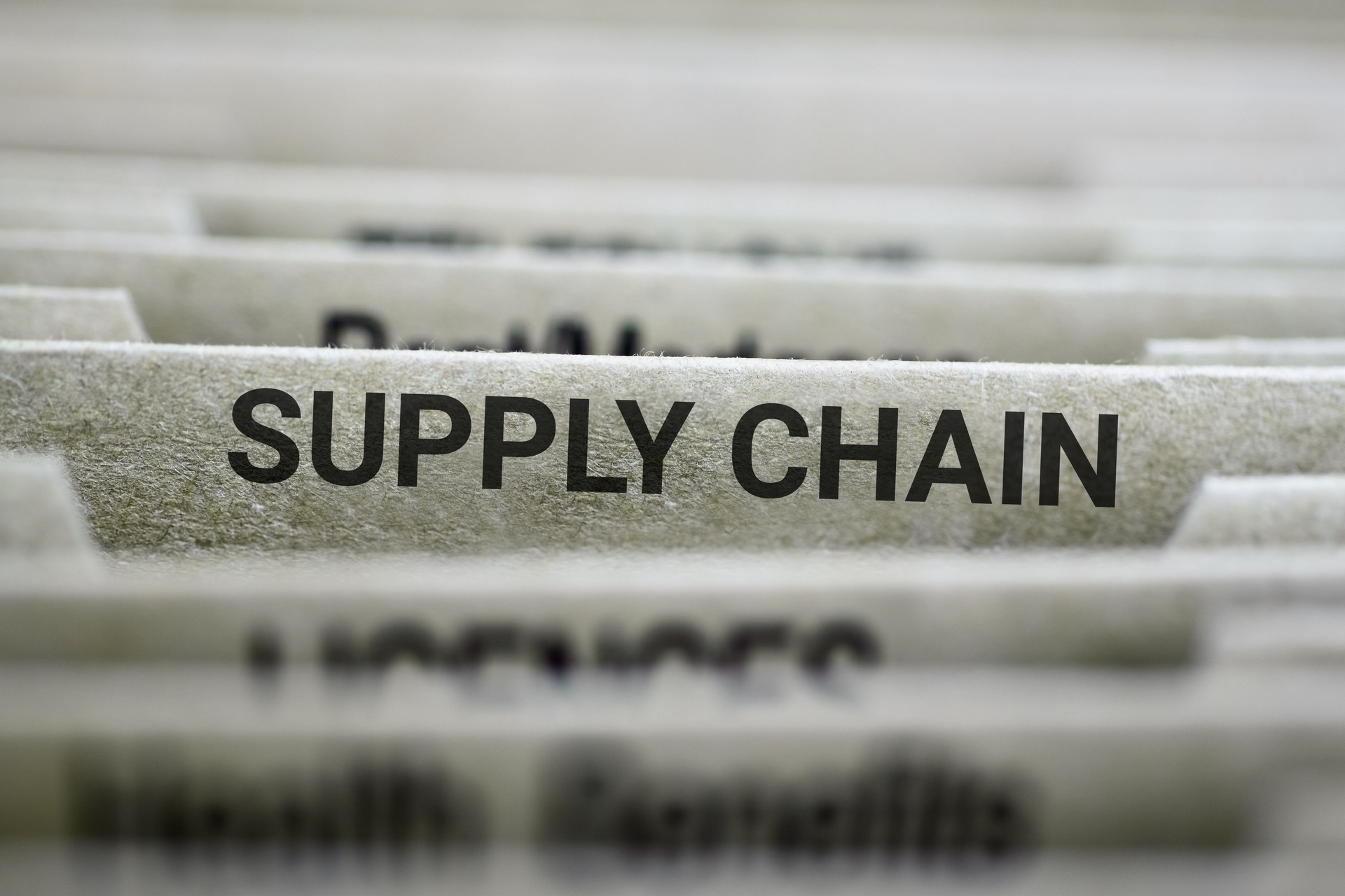 Organized supply chain documents in labeled file folders